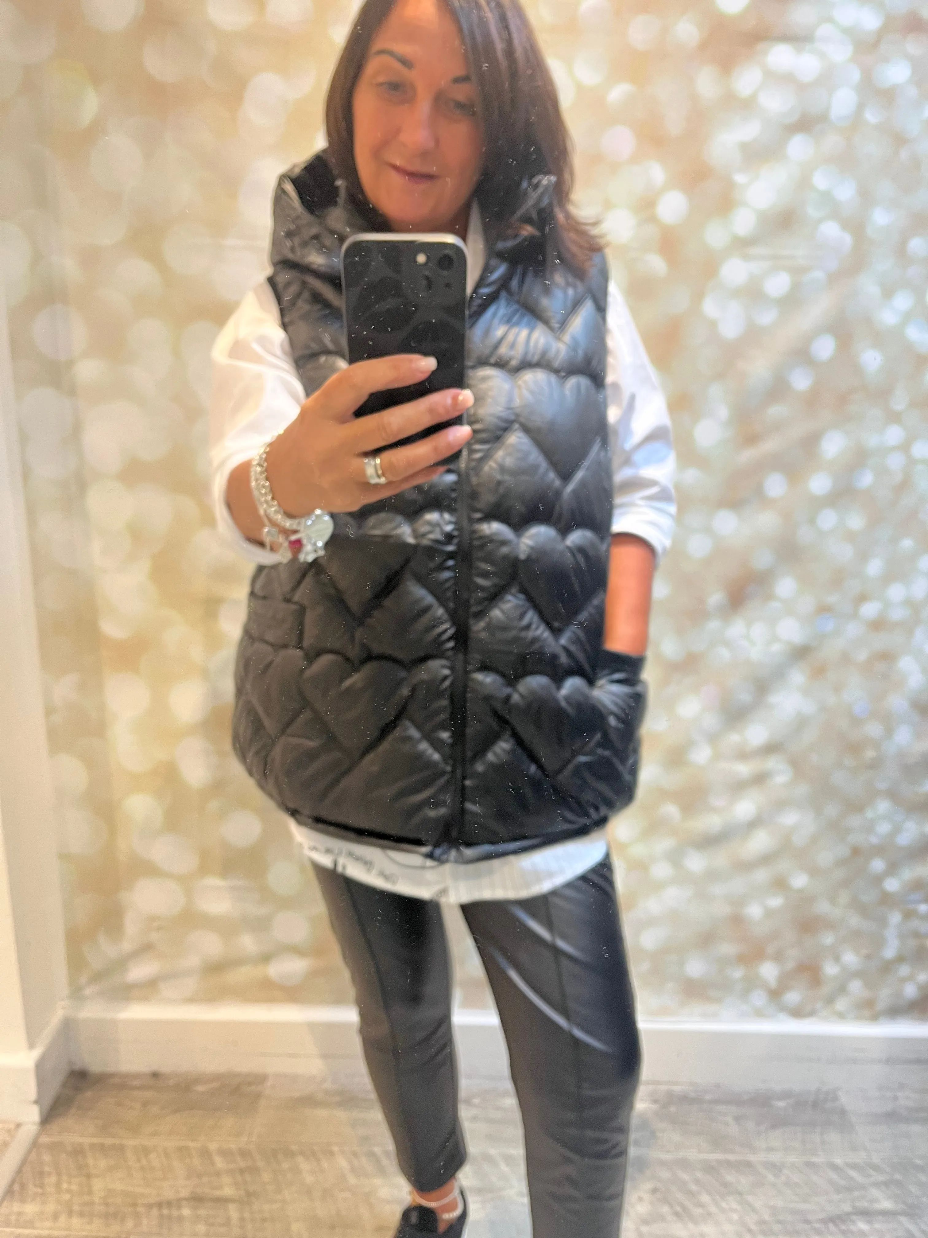 Short quilted metallic gilet